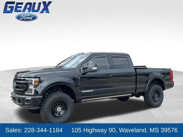 Used 2021 Black Metallic Ford Lariat image 1