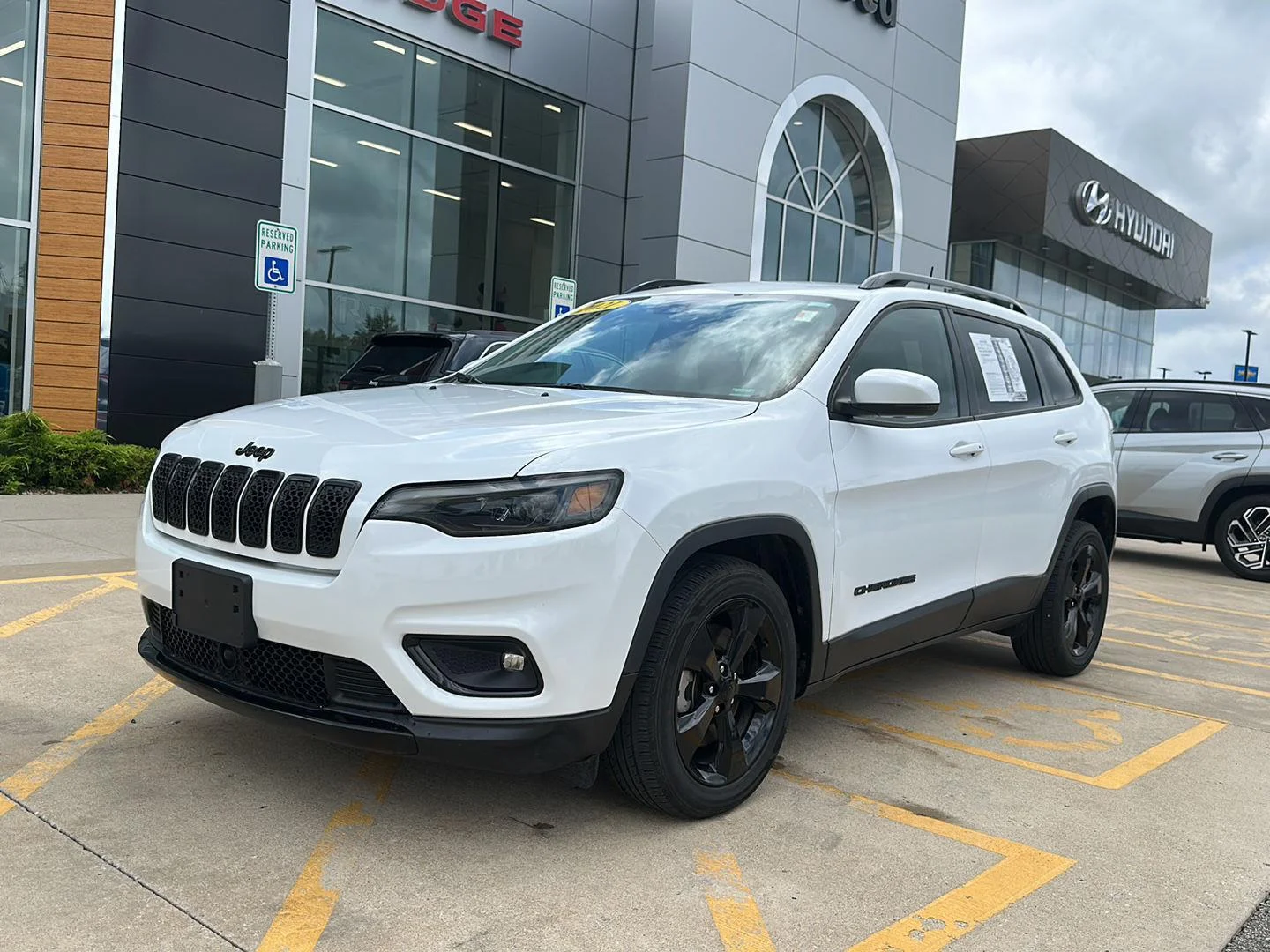Certified Used 2021 Bright White Clearcoat Jeep Altitude image 1
