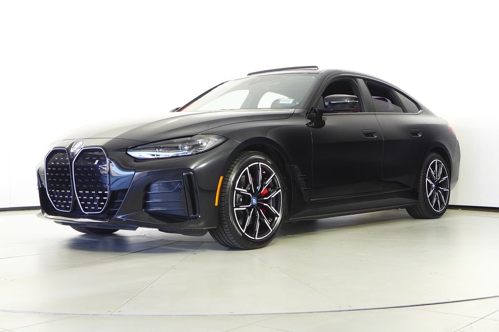 Used 2023 Black Sapphire Metallic BMW eDrive40 image 2