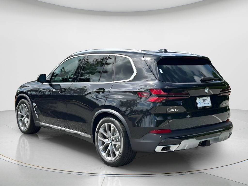 New 2026 Black Sapphire Metallic BMW xDrive50e image 7