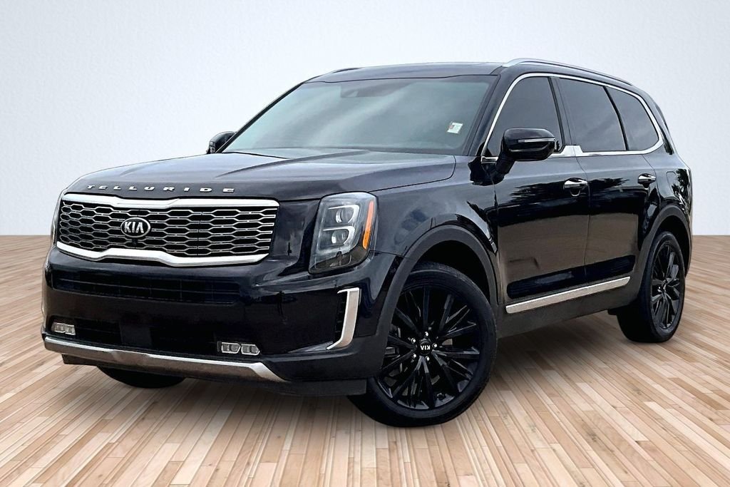 Used 2020 Black Kia SX image 1