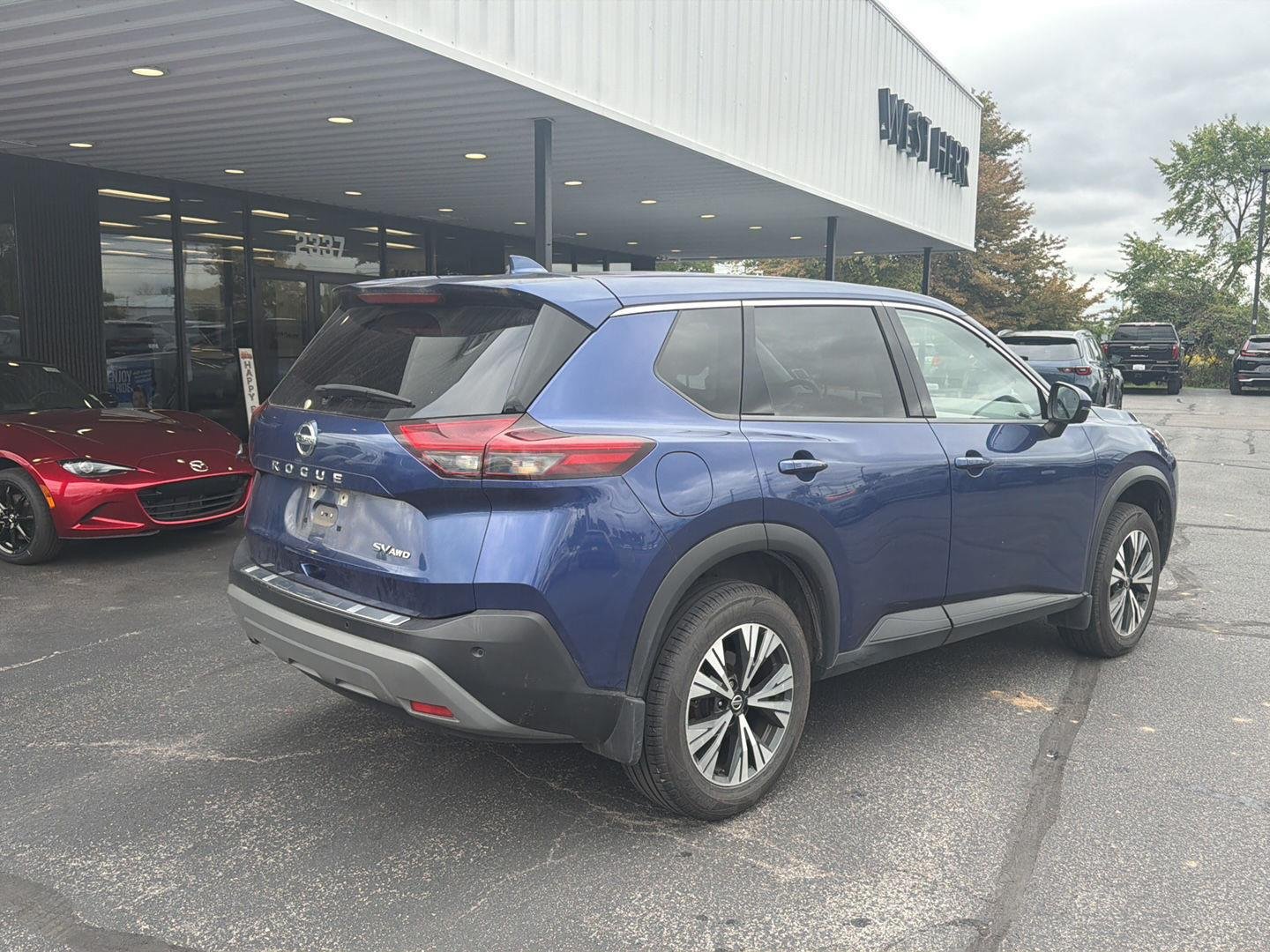 Used 2021 Caspian Blue Metallic Nissan SV image 8