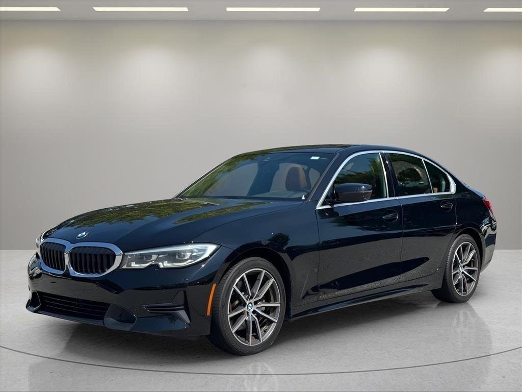 Used 2021 Portimao Blue Metallic BMW 330i image 1