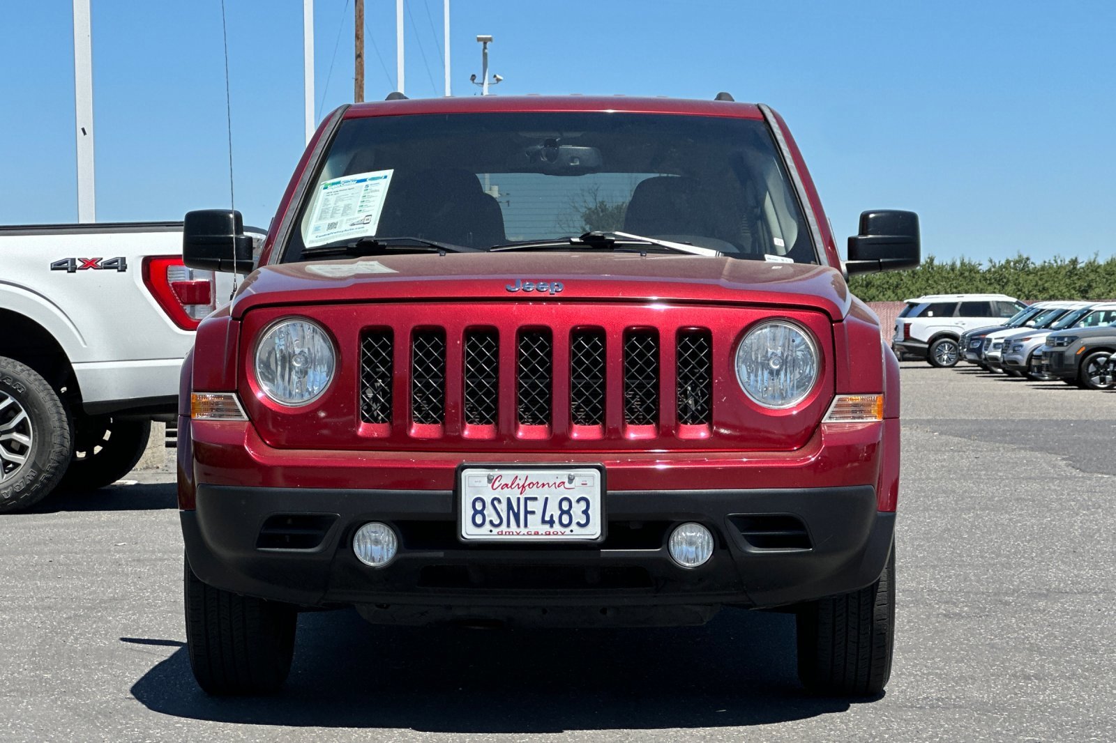 Used 2016 Deep Cherry Red Crystal Pearlcoat Jeep Sport image 9