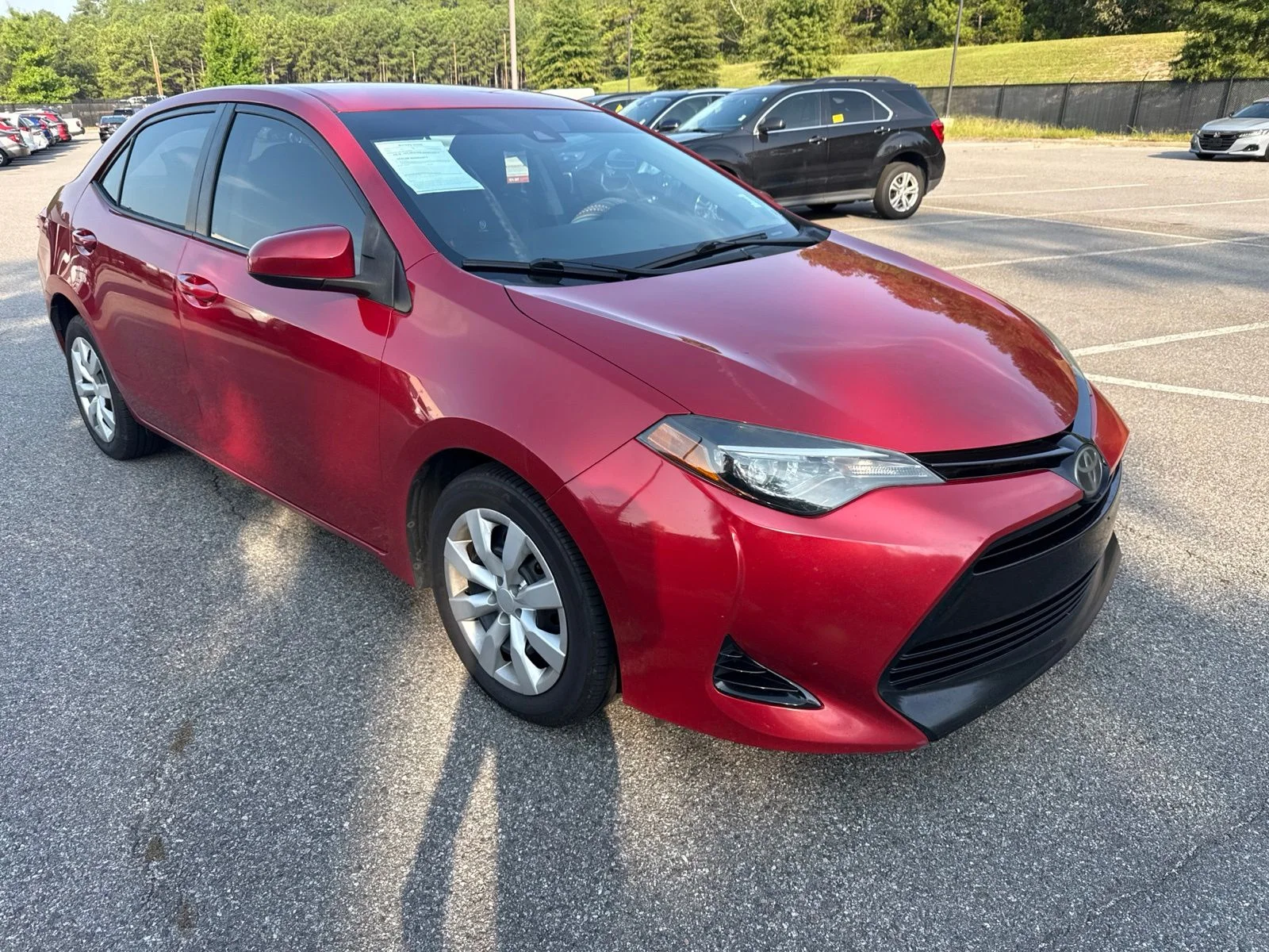 Used 2018 Red Toyota LE image 1