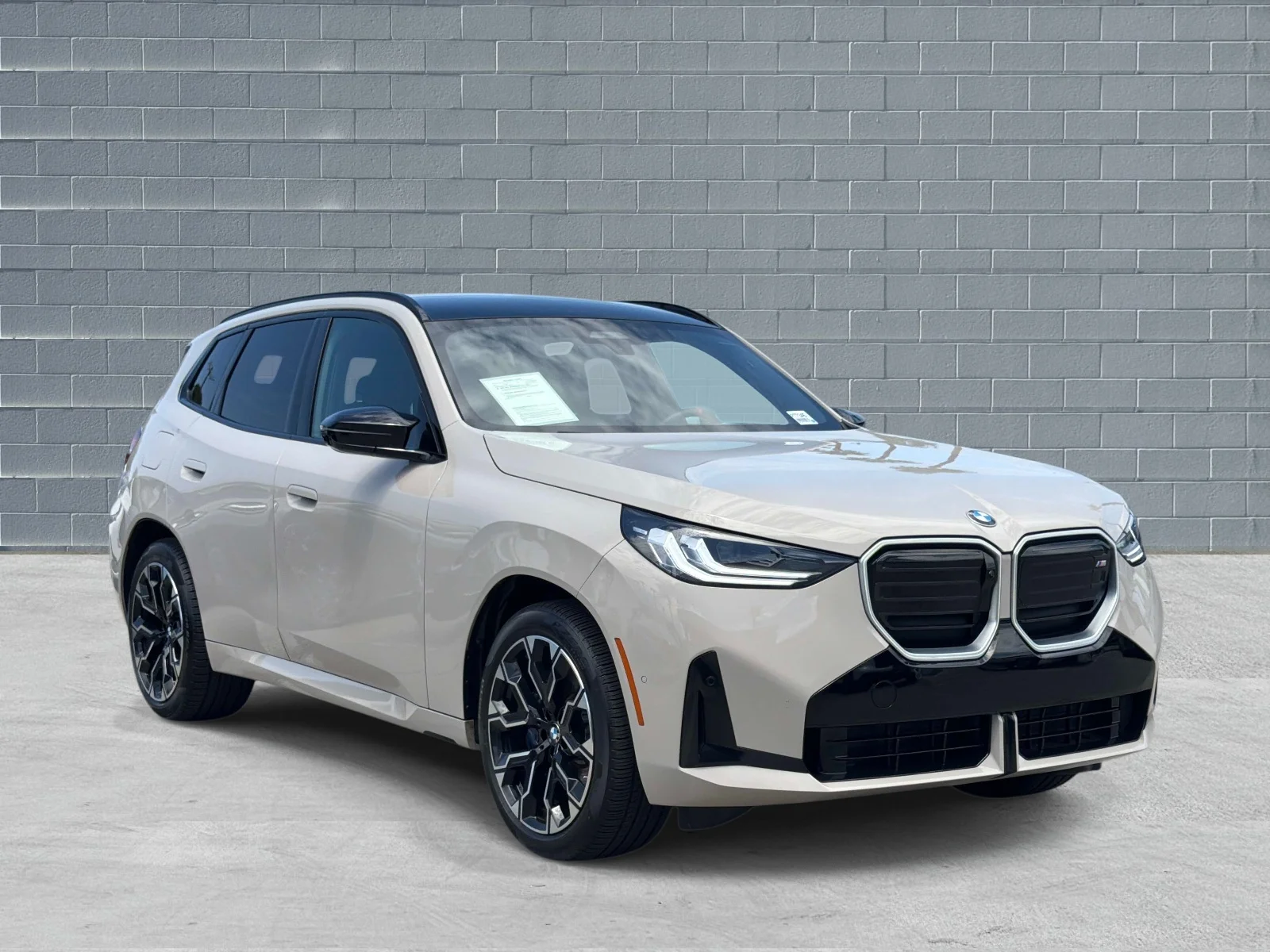 Used 2026 Dune Grey Metallic BMW M50 xDrive Sports Activity Vehicle image 1