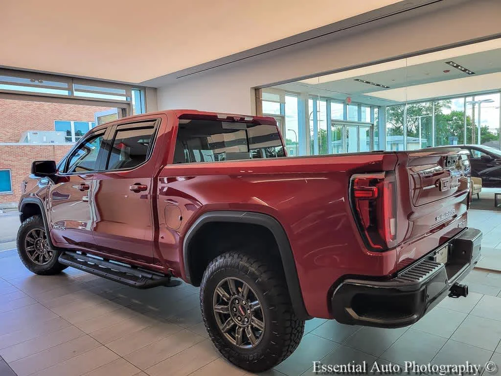 Used 2024 Volcanic Red Tintcoat GMC AT4X image 6