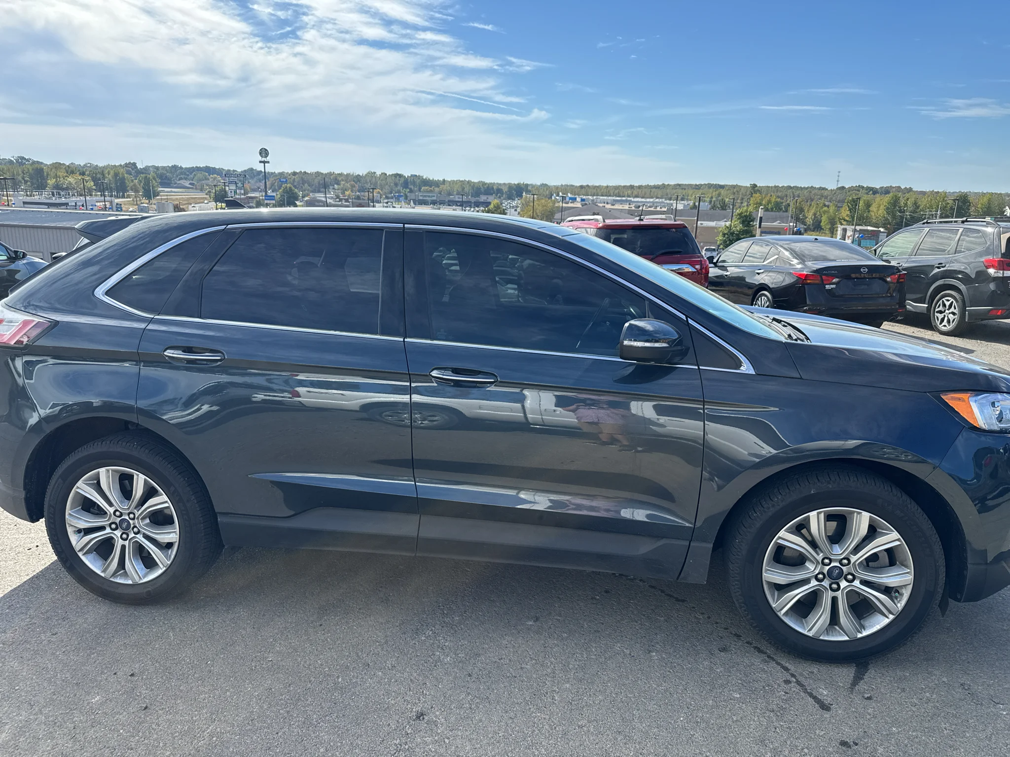 Certified Used 2022 Stone Blue Metallic Ford Titanium image 2