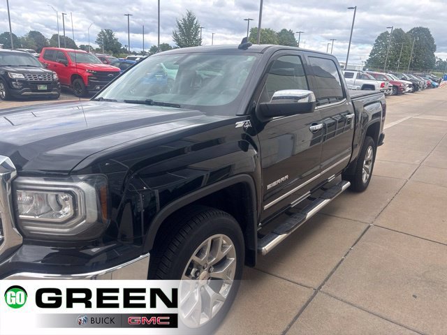 Used 2018 ONYX BLACK GMC SLT image 1