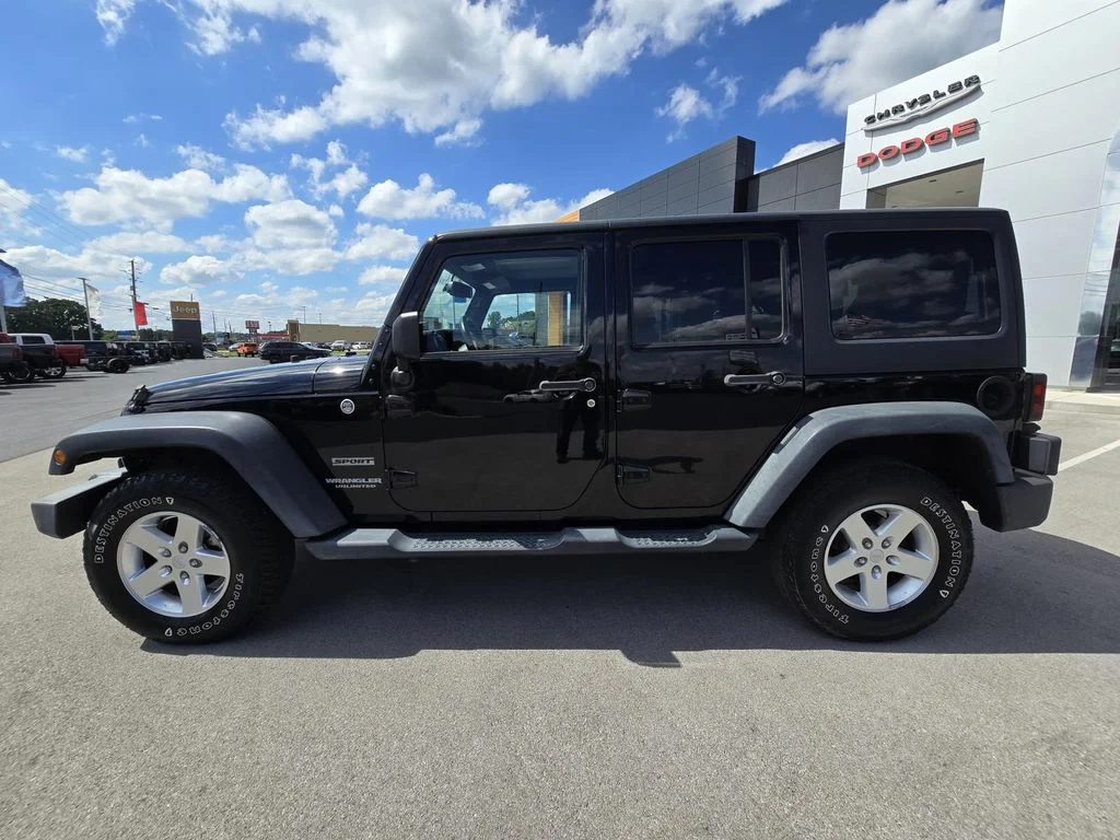 Used 2014 Black Clearcoat Jeep Sport image 7