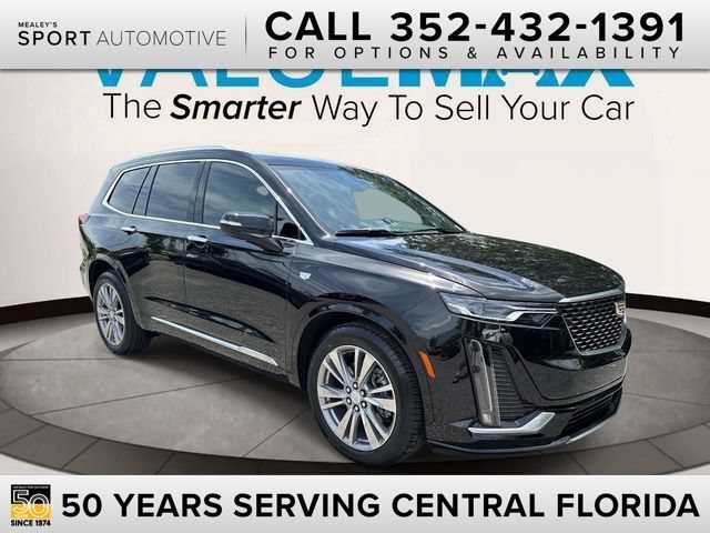 Used 2024 Stellar Black Metallic Cadillac Premium Luxury image 1