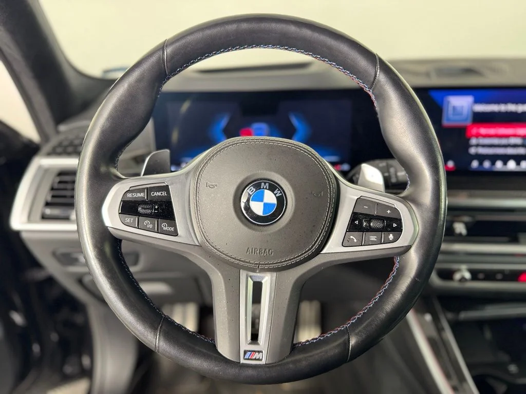 Certified Used 2024 Black Sapphire Metallic BMW M60i image 16