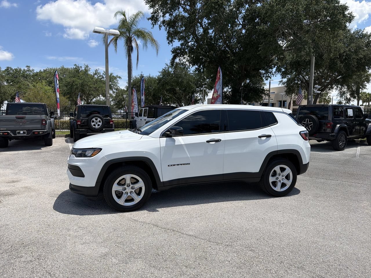 Used 2023 Bright White Clearcoat Jeep Sport image 1