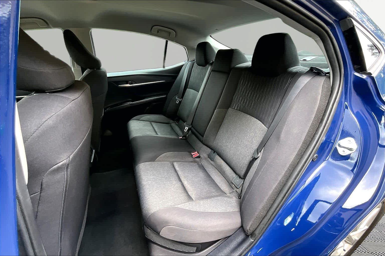 Used 2025 Reservoir Blue Toyota LE image 21