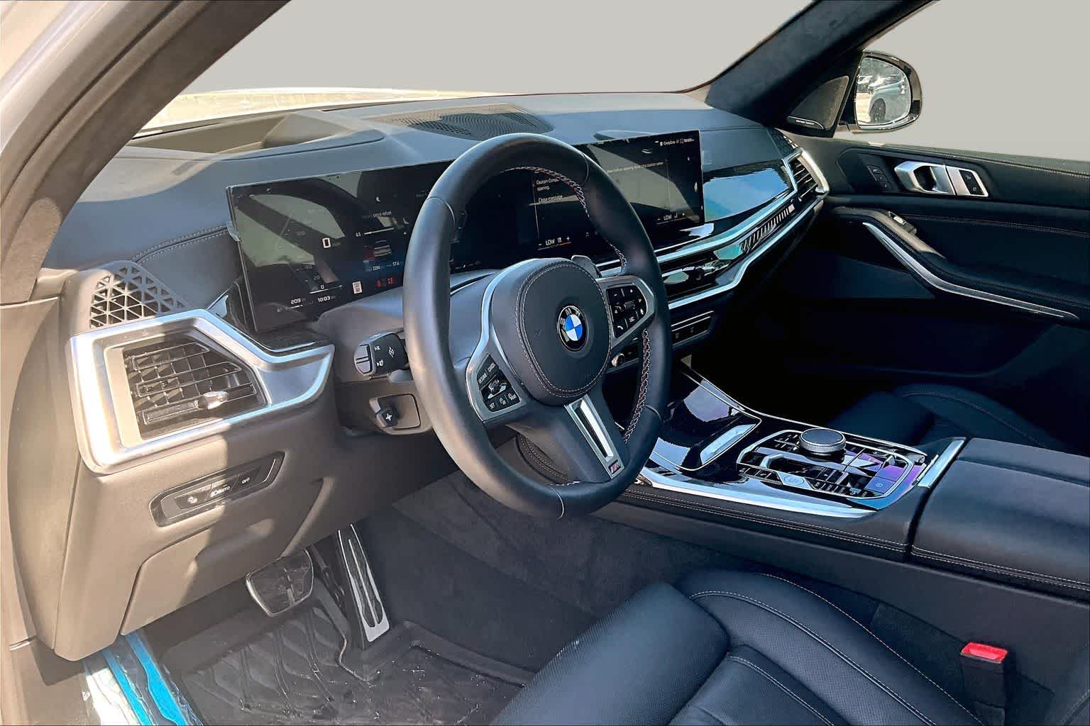 Used 2025 Mineral White Metallic BMW M60i image 15