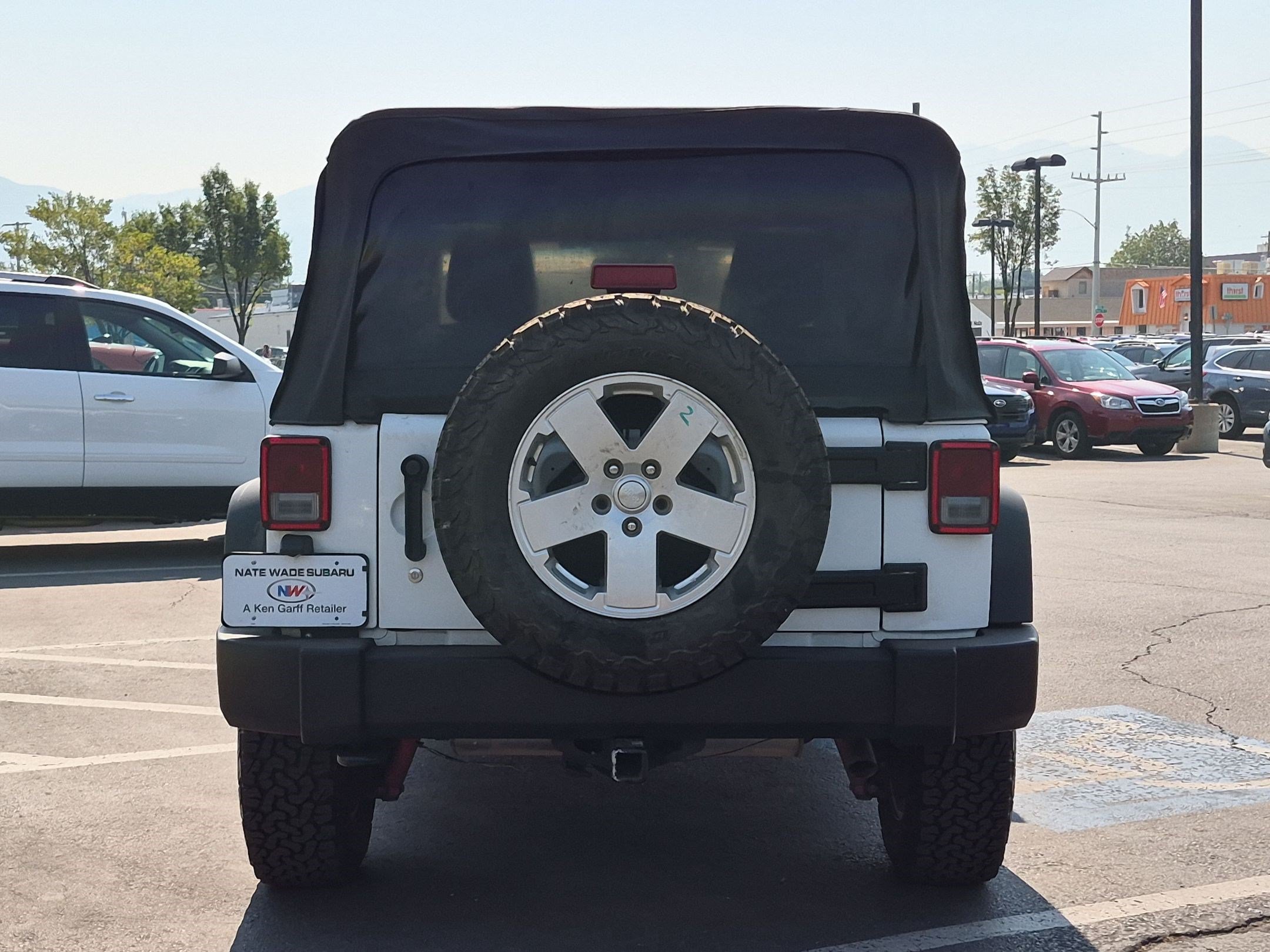 Used 2016 Bright White Clearcoat Jeep Rubicon image 4