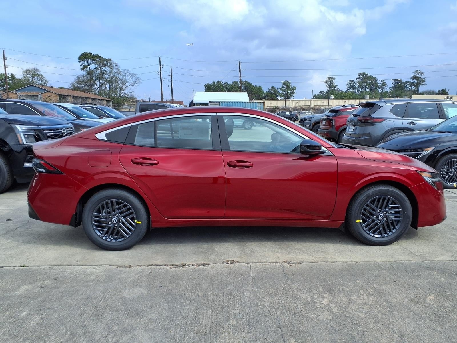 2026 Nissan Sentra SV Red at Robbins Nissan
