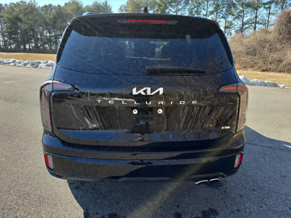 Used 2024 Ebony Black Kia SX Prestige X-Line image 5