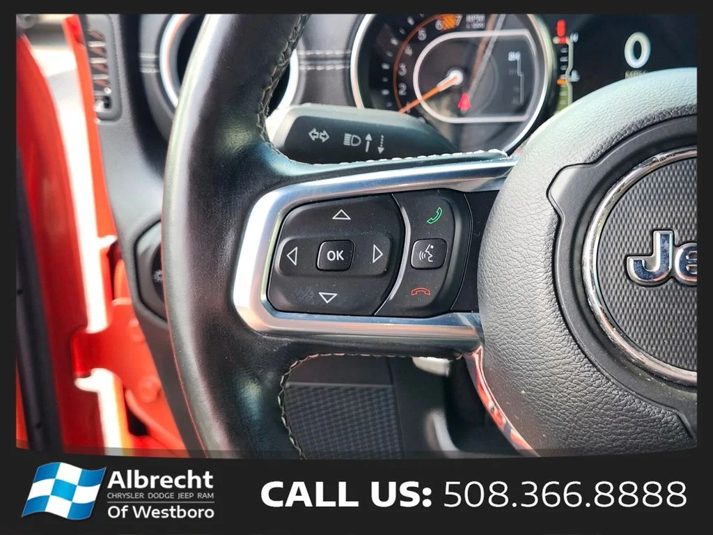Used 2020 Orange Jeep Unlimited Sahara image 28