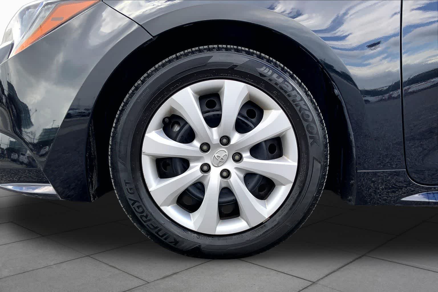 Used 2024 Midnight Black Metallic Toyota LE image 11