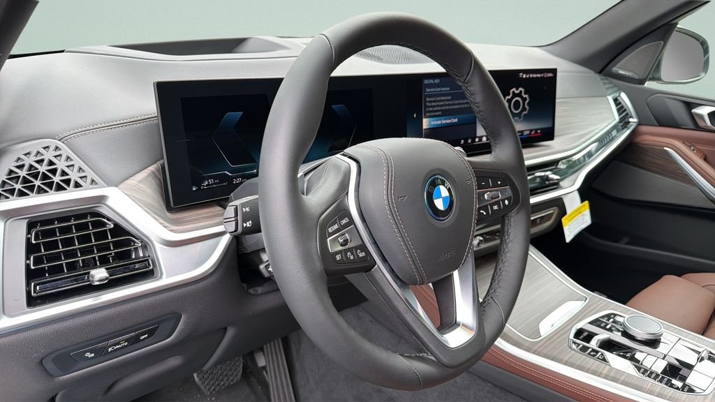 New 2026 Tanzanite Blue II Metallic BMW xDrive50e image 21