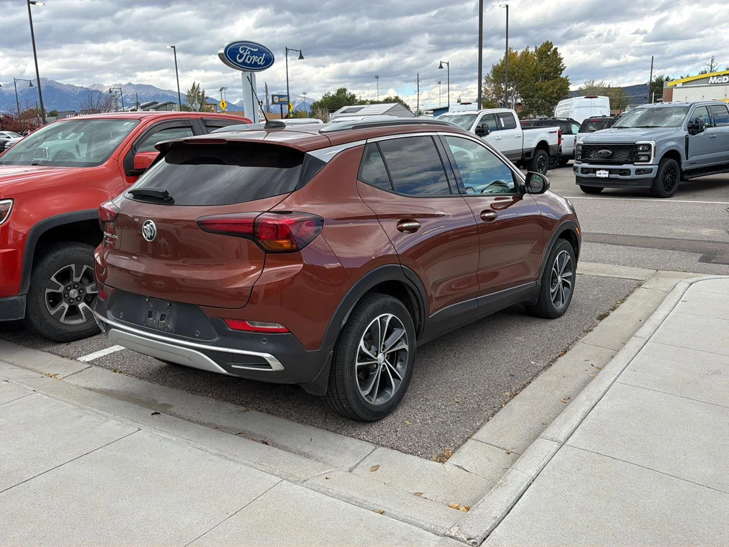 Used 2021 BURNISHED BRONZE METALLIC Buick Essence image 3
