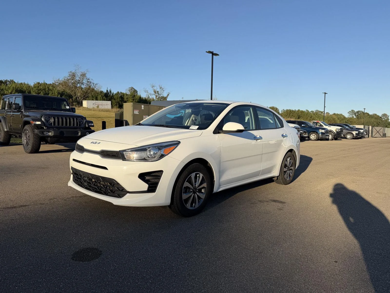 Used 2022 Clear White Kia S image 1