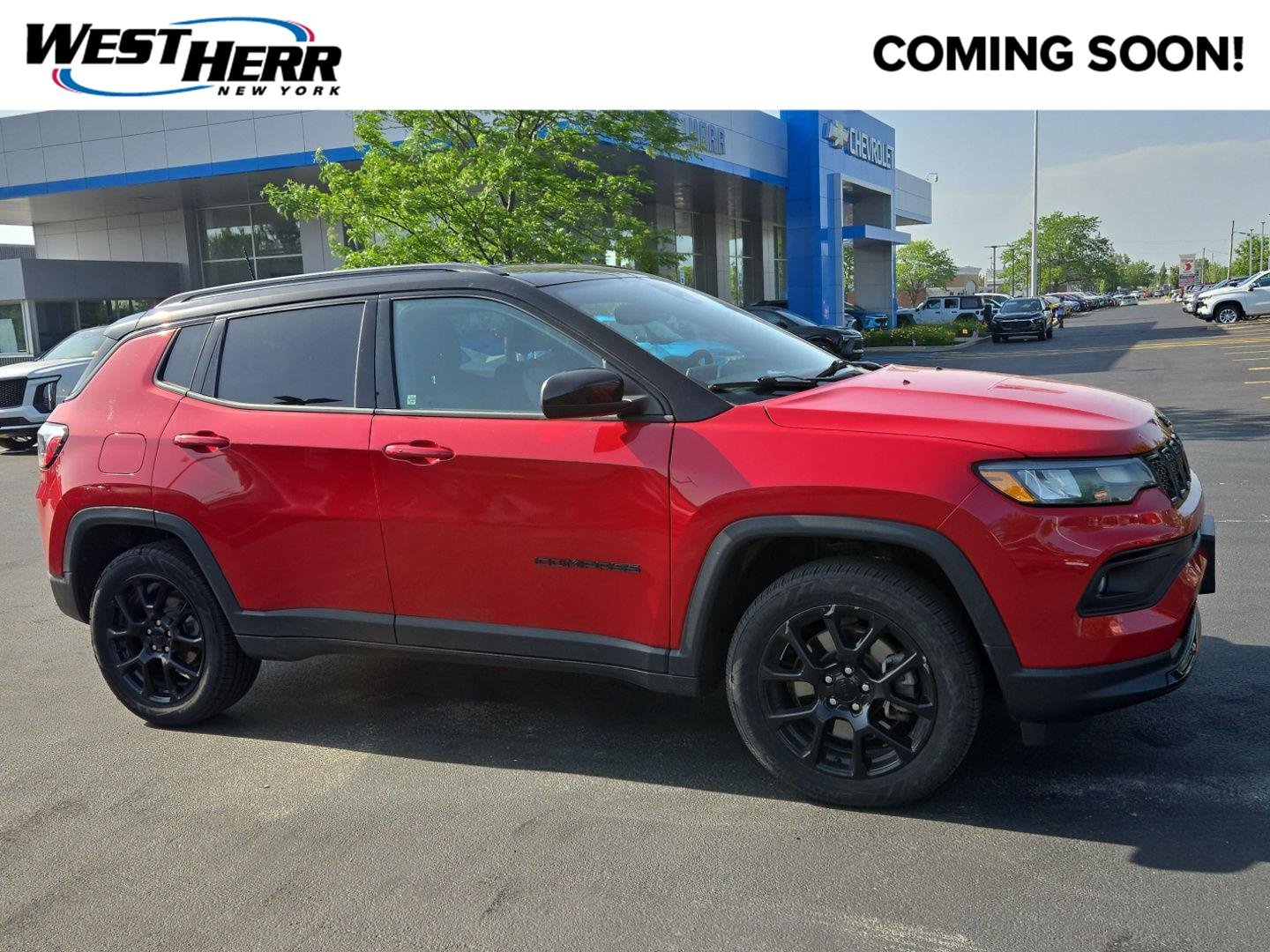 Used 2023 Redline Pearlcoat Jeep Altitude image 1