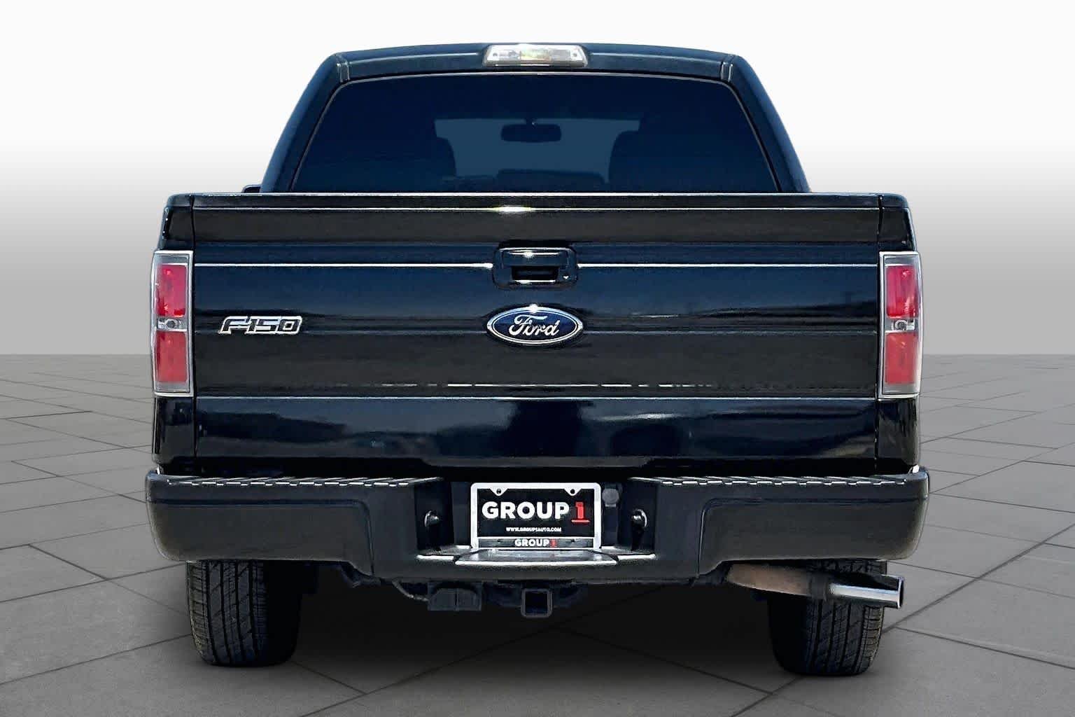 Used 2010 Tuxedo Black Ford XLT image 4