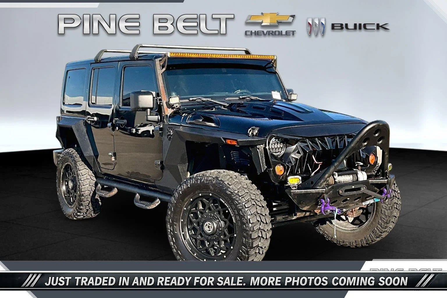 Used 2013 Black Jeep Sport image 1