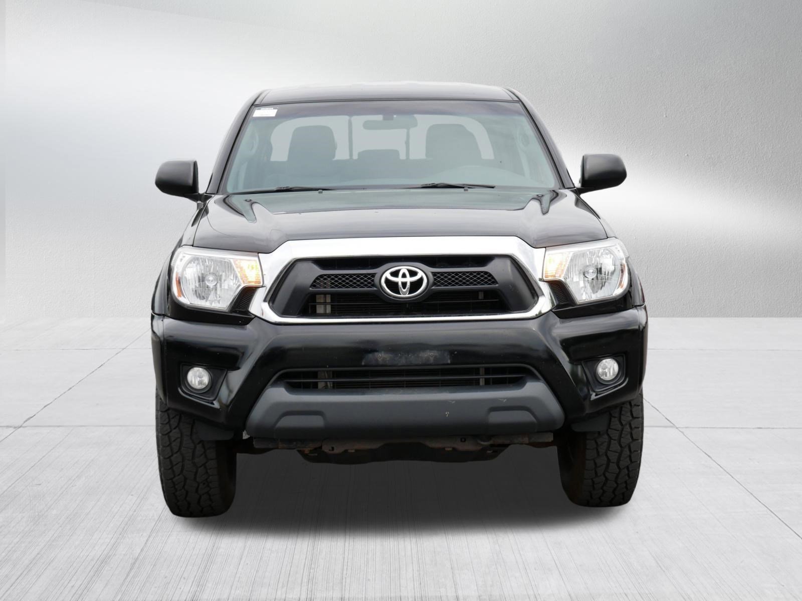 Used 2014 Toyota Tacoma Base with VIN 3TMLU4EN9EM135754 for sale in Brooklyn Center, Minnesota