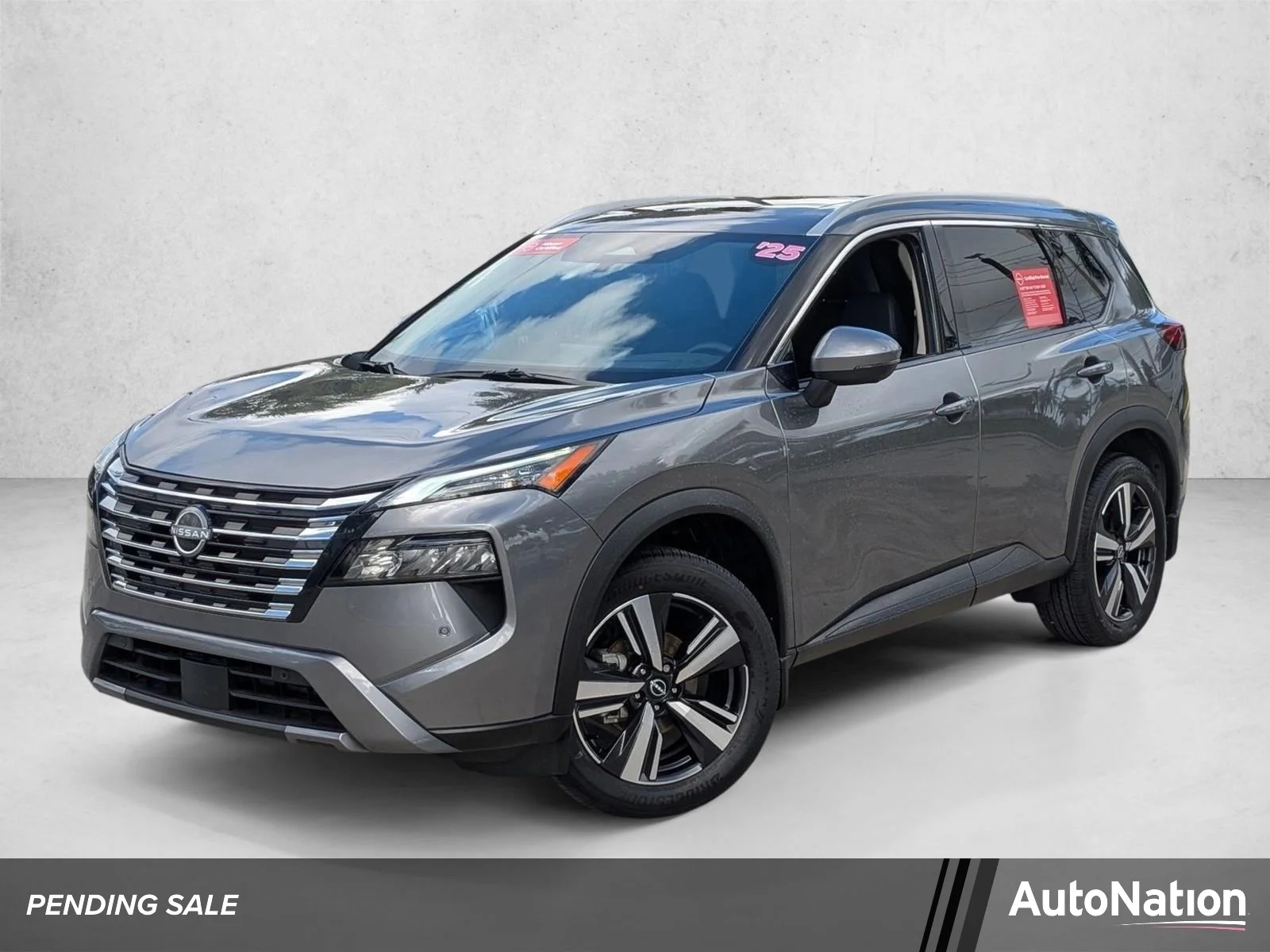 Used 2025 Gun Metallic Nissan SL image 1