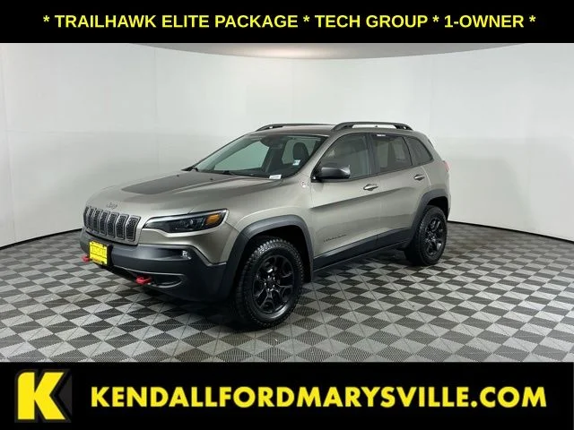 Used 2020 Light Brownstone Pearlcoat Jeep Trailhawk image 1