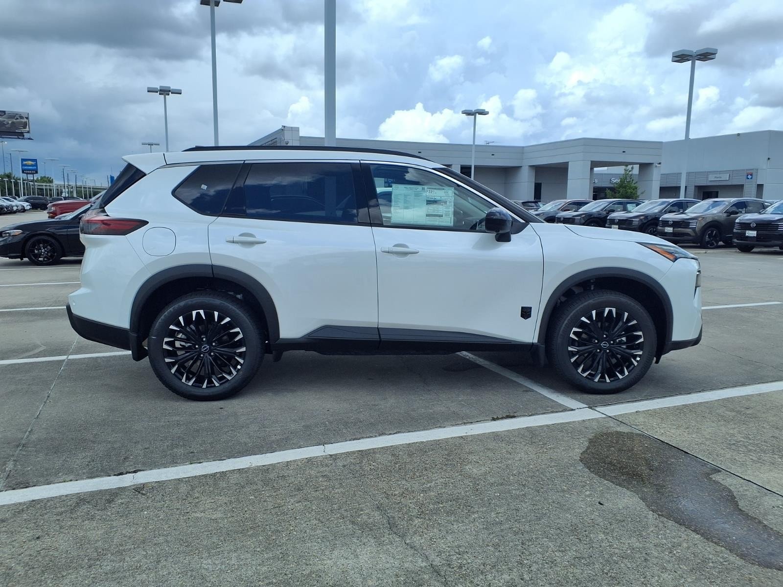 2026 Nissan Rogue Dark Armor™ White at Robbins Nissan