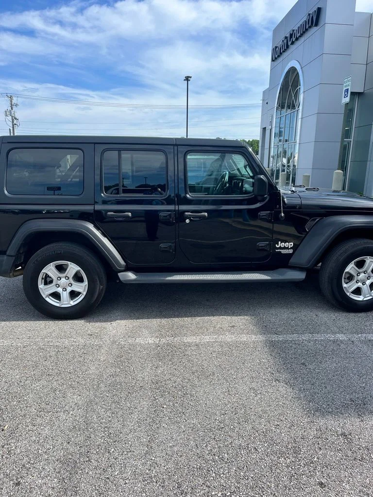 Used 2020 Black Clearcoat Jeep Unlimited Sport S image 1