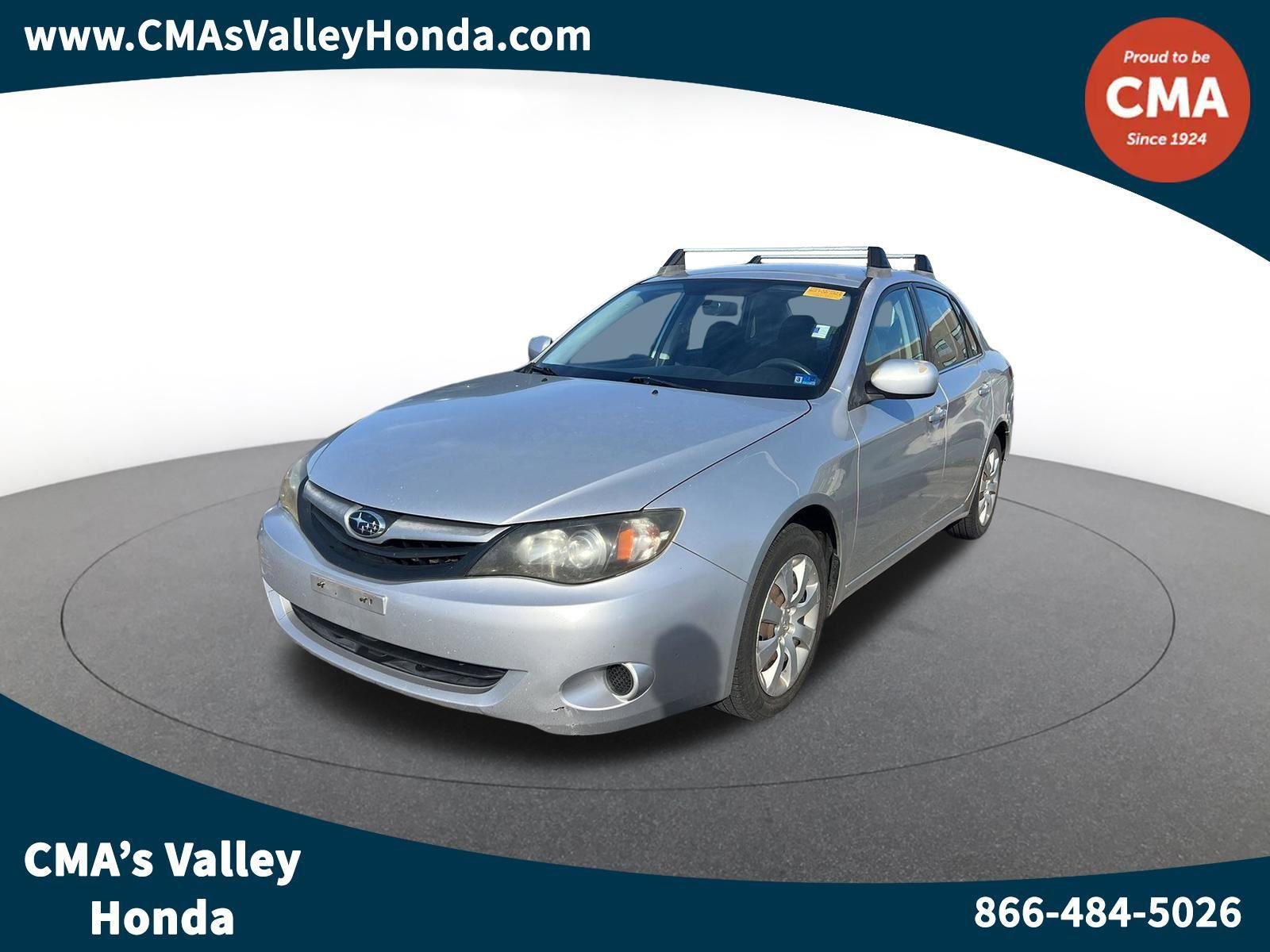 Used 2011 Spark Silver Metallic Subaru 2.5i image 1