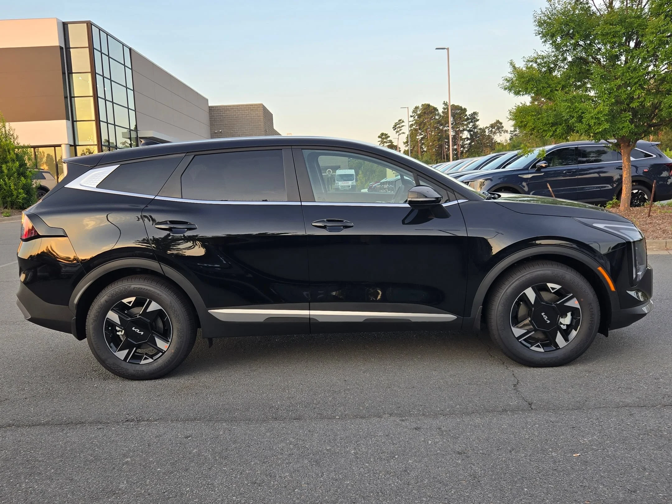 New 2026 Ebony Black Kia LX image 8