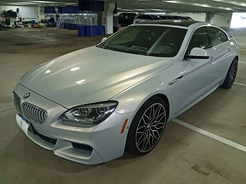 Used 2013 Moonstone Metallic BMW 650i xDrive Gran Coupe image 1