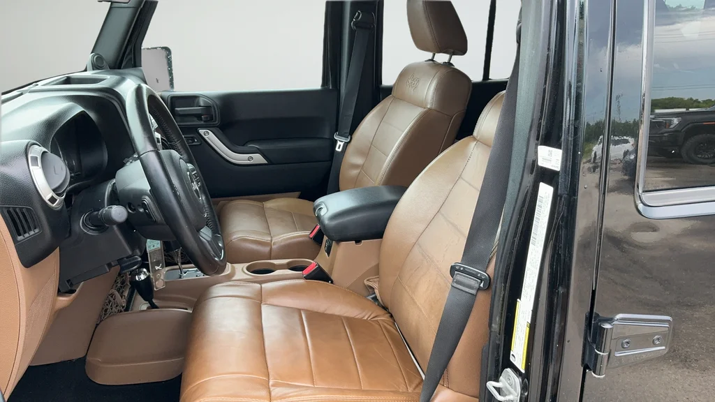 Used 2012 Black Jeep Unlimited Sahara image 16