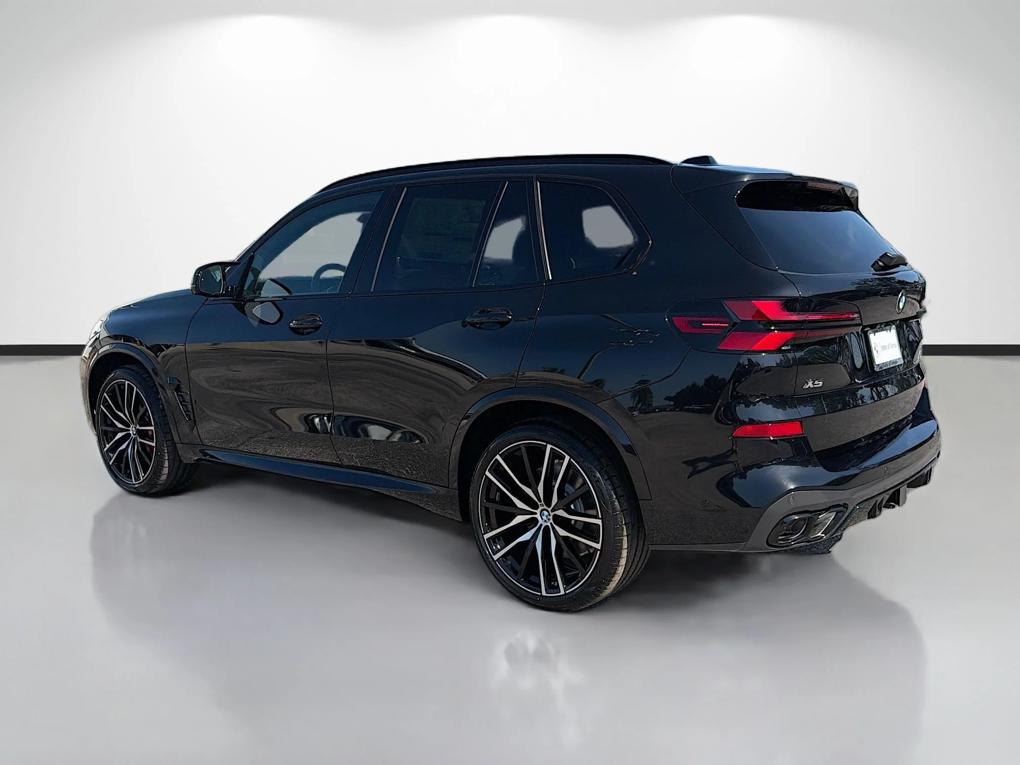 New 2026 Black Sapphire Metallic BMW M60i image 5