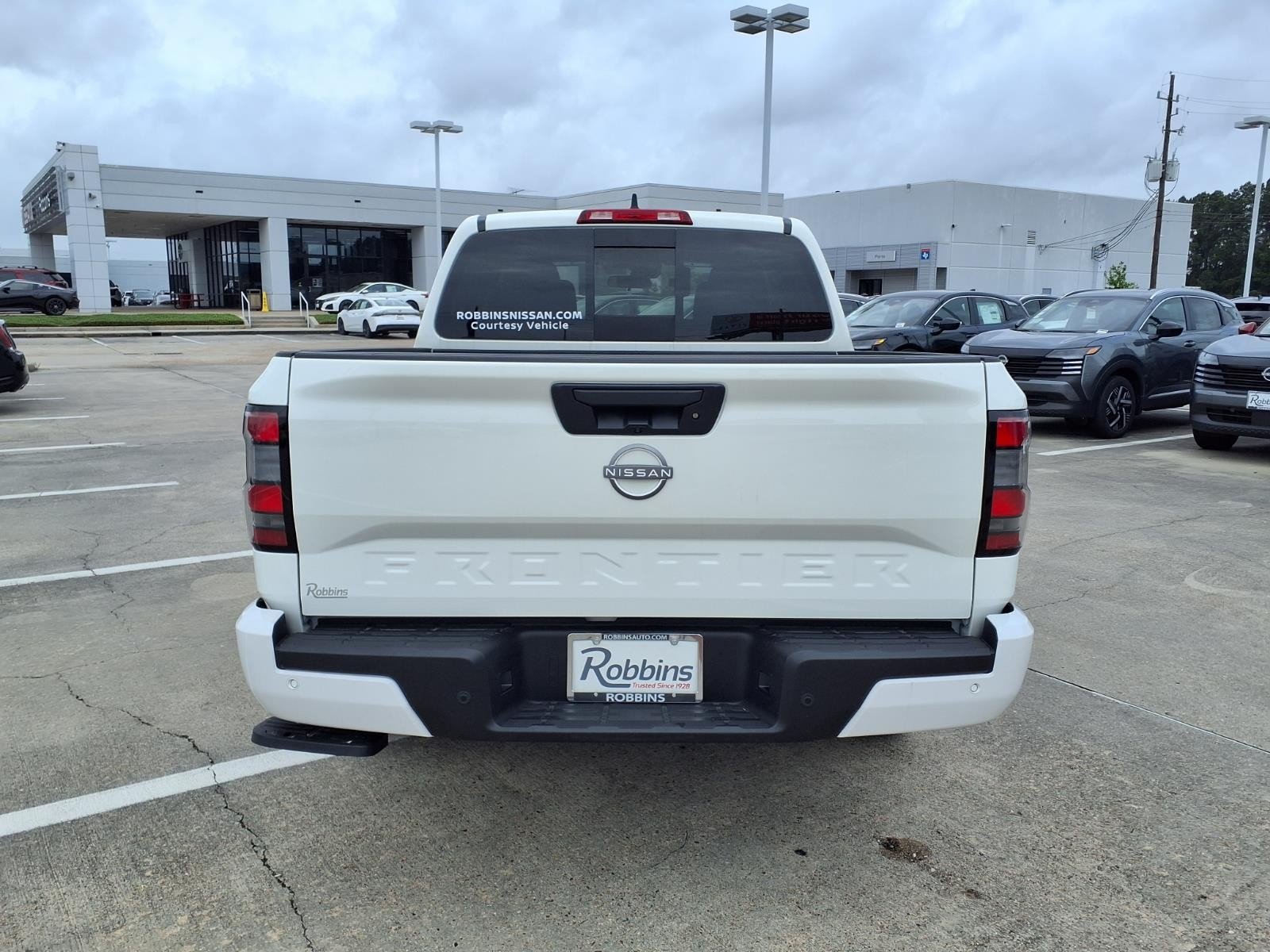2026 Nissan Frontier SV White at Robbins Nissan