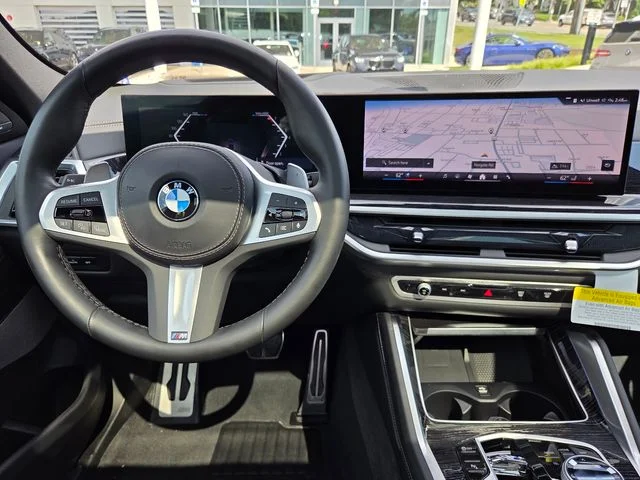 Certified Used 2024 Black Sapphire Metallic BMW xDrive40i image 13