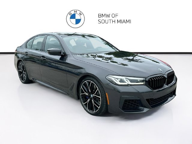 Used 2023 Gray BMW M550i xDrive image 1