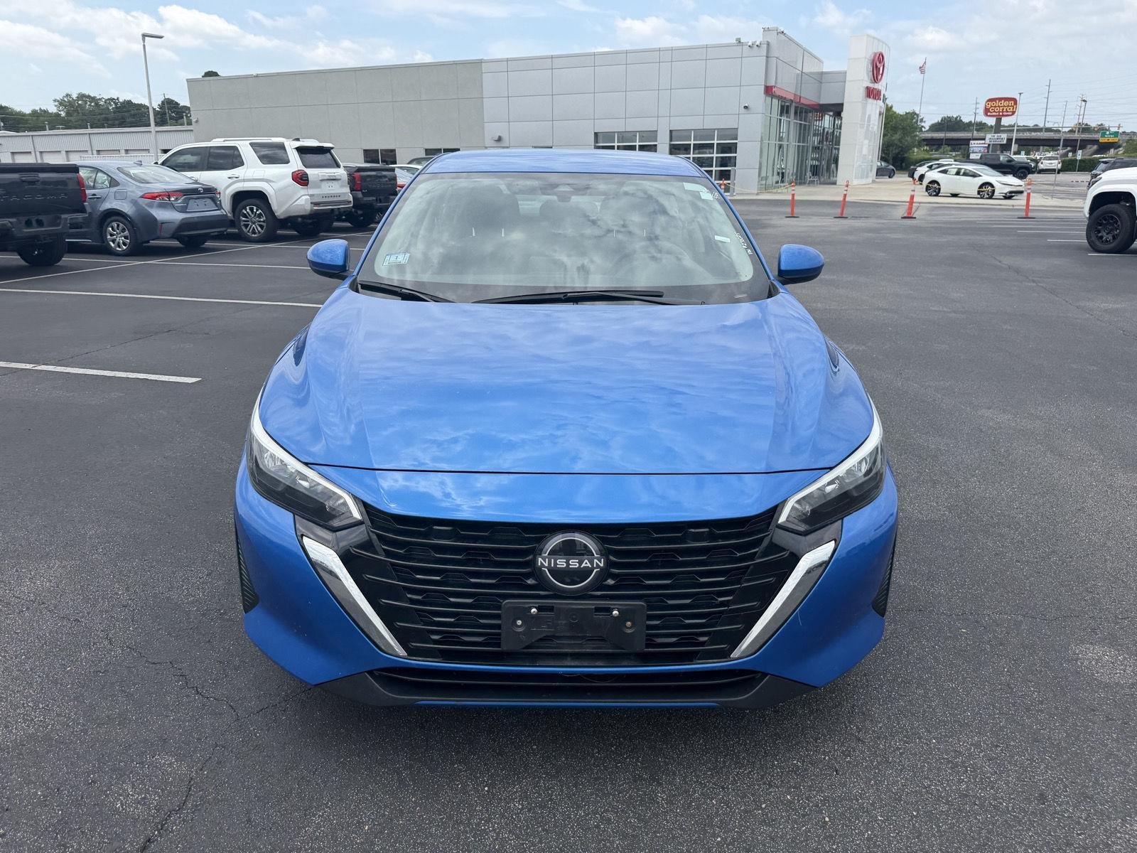 Used 2025 Electric Blue Metallic Nissan SV image 2