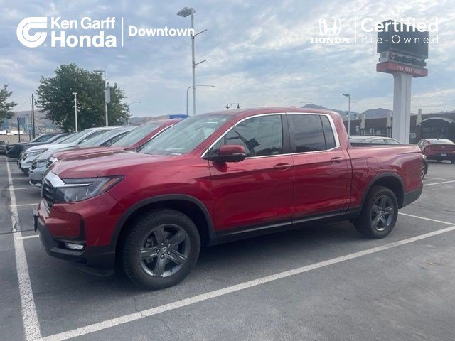 Certified Used 2023 Radiant Red Metallic II Honda AWD RTL image 1