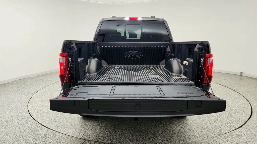 Used 2025 Agate Black Metallic Ford XLT 4WD SuperCrew 5.5