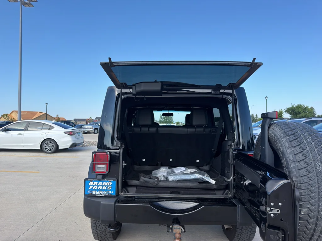 Used 2015 Black Clearcoat Jeep Altitude image 7
