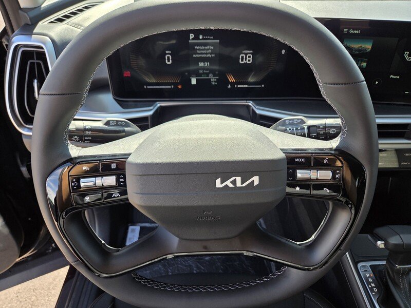 New 2026 Ebony Black Kia LX image 10