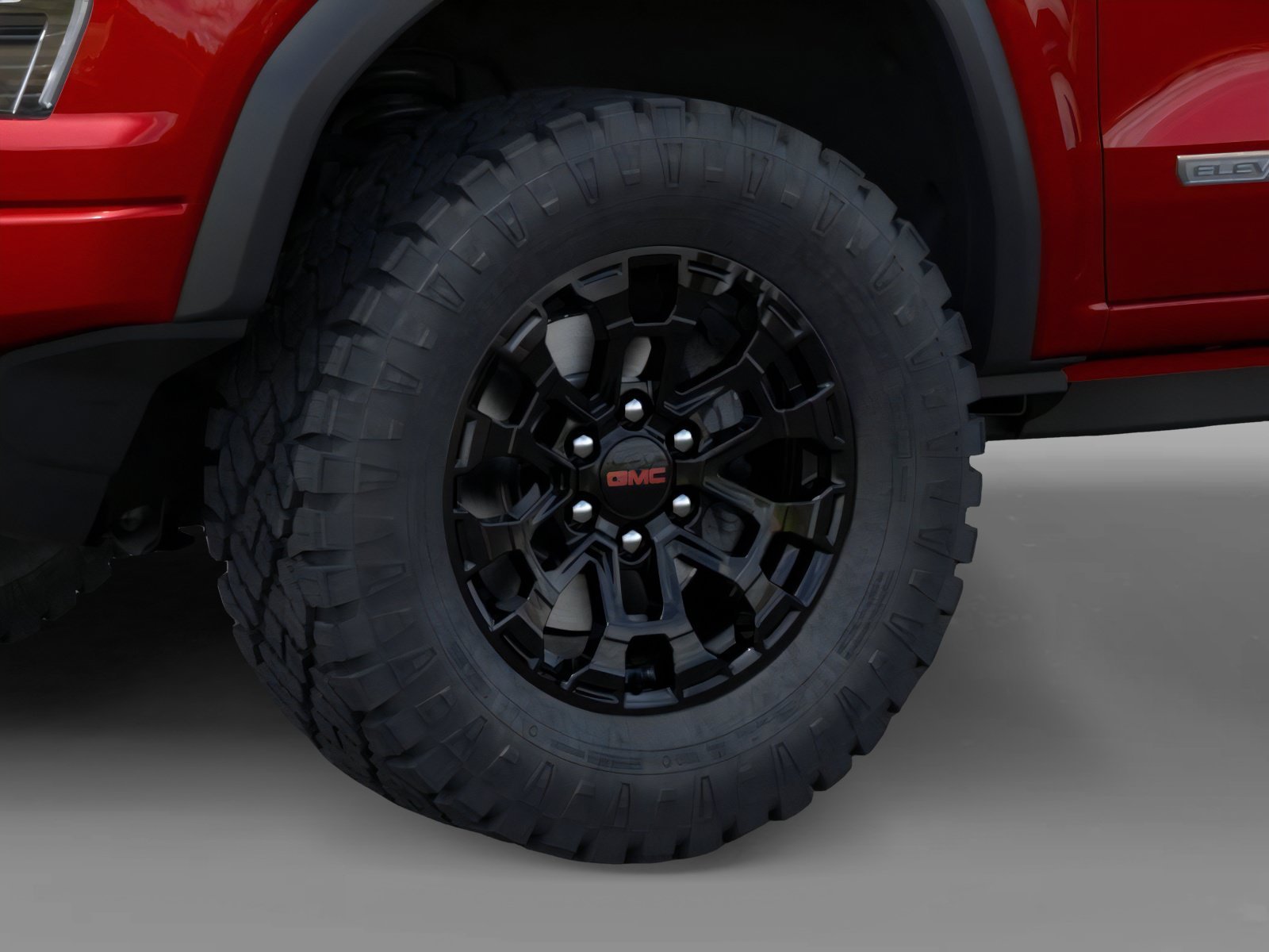 New 2026 Volcanic Red Tintcoat GMC 2WD Elevation image 9