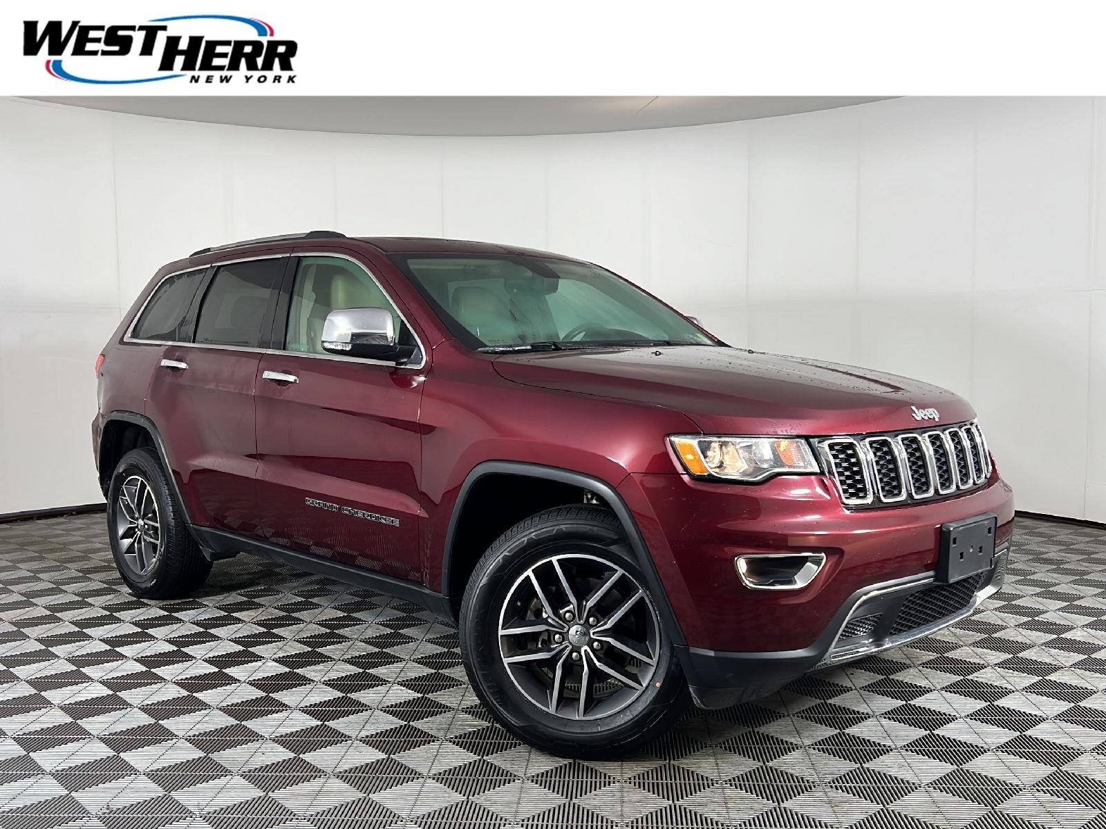 Used 2018 Velvet Red Pearlcoat Jeep Limited image 1